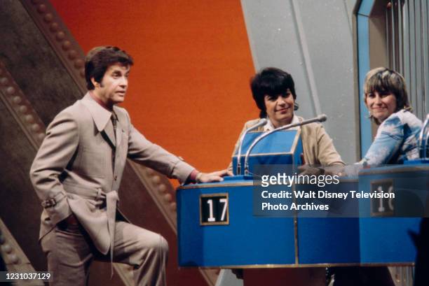 Dick Clark, Jo Ann Worley, contestant appearing on the ABC tv game show series 'The $20,000 Pyramid', ABC's Pyramid game show series.