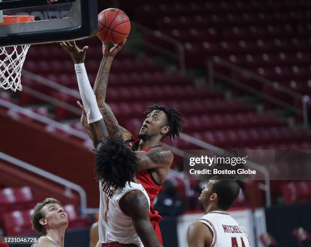 State player Manny Bates , #15, goes up for shot during early game action against Boston College. The Boston College Eagles men's basketball team...