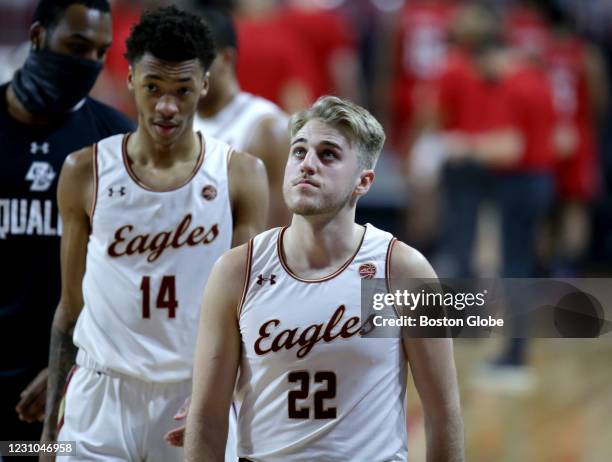 Boston College player Rich Kelly looks up at the score board during late game action against N.C. State. The Boston College Eagles men's basketball...