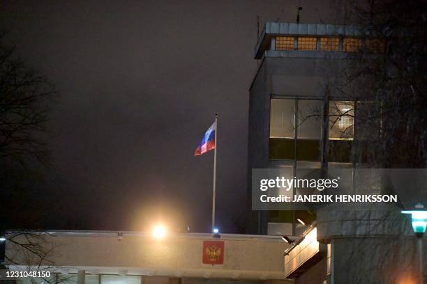 The Russian flag fly at their embassy in Stockholm, Sweden on Februry 8, 2021. - Germany, Sweden and Poland on Monday each threw out a Russian...