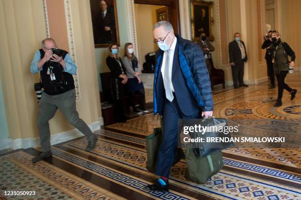 Senate Majority Leader Charles E. Schumer arrives as preparations for former US President Donald Trump's trial are made on Capitol Hill February 8 in...