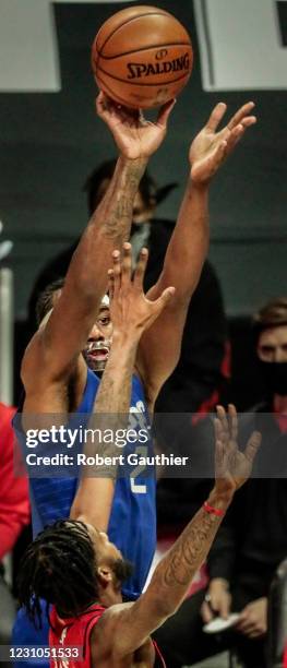 Los Angeles, CA, Wednesday December 30, 2020 - LA Clippers forward Kawhi Leonard shoots a three pointer over Portland Trail Blazers guard Rodney Hood...