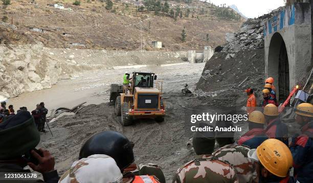 Rescue operations underway at Tapovan Tunnel, after a glacier broke off in Joshimath causing a massive flood in the Dhauli Ganga river, in Chamoli...