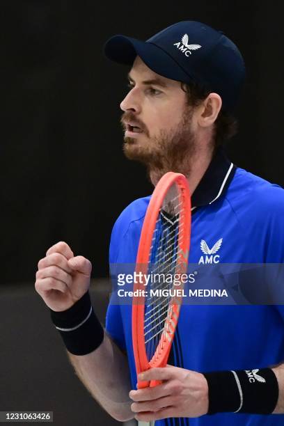Scotlands Andy Murray reacts after defeating Germanys Maximilian Marterer during their first round tennis match at the ATP Challenger tournament in...