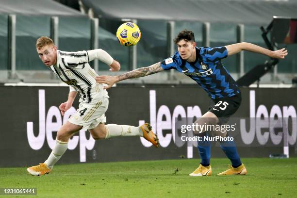 Dejan Kulusevski of Juventus competes for the ball with Alessandro Bastioni of FC Internazionale during the Coppa Italia semi-final Juventus and FC...
