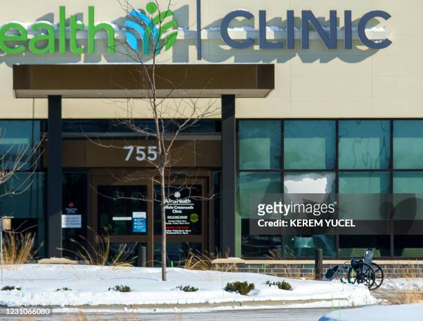 Broken window at the Allina Health Clinic in Buffalo, Minnesota on February 9 after a gunman opened fire inside. - The shooting left at least five...