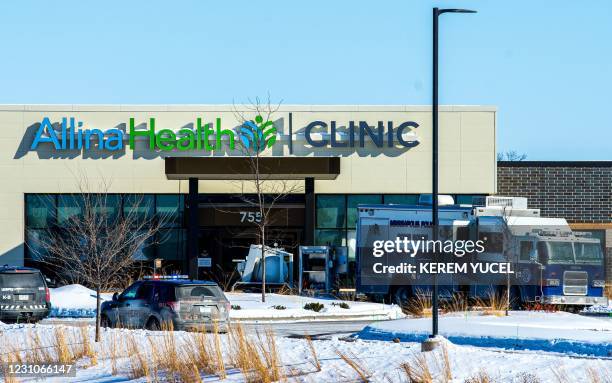 Police Bomb Squad investigates the scene at Allina Health Clinic in Buffalo, Minnesota on February 9 after a shooting. - The shooting left at least...