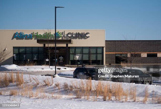 General view of the damaged exterior windows of the Allina Health Clinic where a shooting took place on February 9, 2021 in Buffalo, Minnesota. Five...