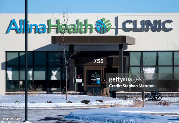 General view of the damaged exterior windows of the Allina Health Clinic where a shooting took place on February 9, 2021 in Buffalo, Minnesota. Five...