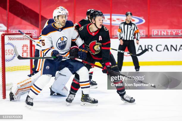 Ottawa Senators Left Wing Brady Tkachuk battles Edmonton Oilers Defenceman Evan Bouchard during second period National Hockey League action between...