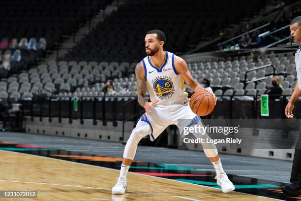 Mychal Mulder of the Golden State Warriors handles the ball against the San Antonio Spurs on February 9, 2021 at the AT&T Center in San Antonio,...