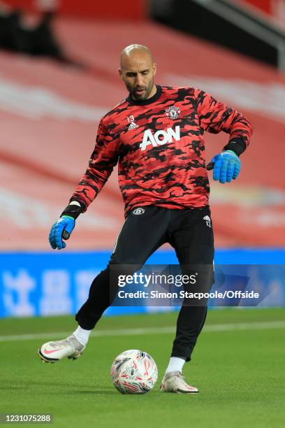 Manchester United goalkeeper Lee Grant warms up before The Emirates FA Cup Fifth Round match between Manchester United and West Ham United at Old...