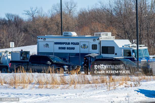Police Bomb Squad investigates the scene at Allina Health Clinic in Buffalo, Minnesota on February 9 after a shooting. - The shooting left at least...