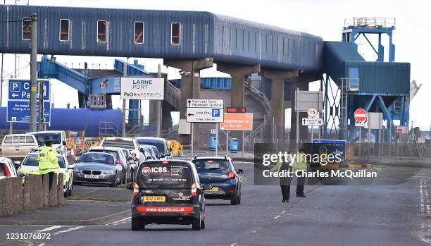 Officers man a police checkpoint at Larne harbour on February 10, 2021 in Larne, Northern Ireland. Port inspection staff have returned to work today...