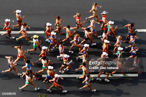 Athletes compete in the women's 20km race walk during day five of the 13th IAAF World Athletics Championships in Daegu city centre on August 31, 2011...