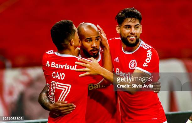 Patrick of Internacional celebrates with teammates after scoring the first goal of their team during the match between Internacional and Sport Recife...
