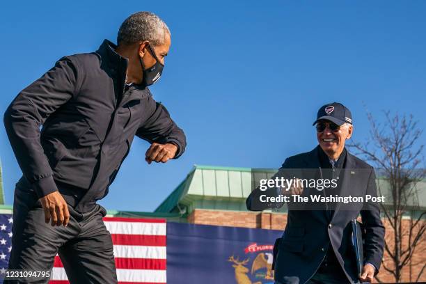Former Vice President and presidential nominee Joe Biden and President Barrack Obama greet each other on stage following remarks during a...