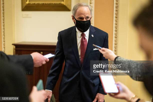 Sen. Tom Carper speaks with reporters on the Senate Side of the U.S. Capitol Building on Thursday, Feb. 11, 2021 in Washington, DC. The third day of...