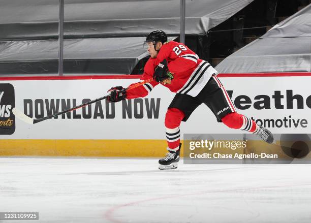 Madison Bowey of the Chicago Blackhawks shoots the puck against the Columbus Blue Jackets in the second period at the United Center on February 11,...