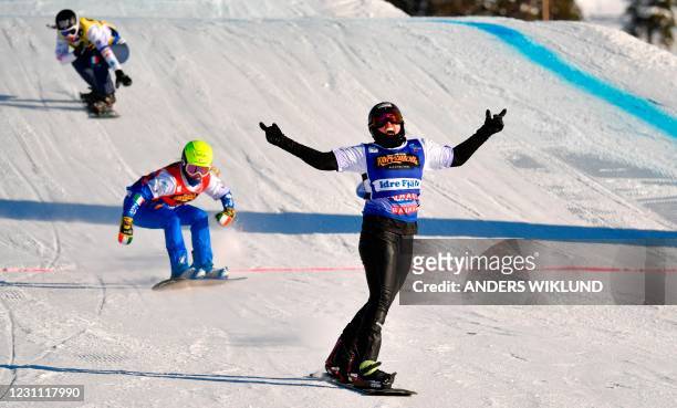Australia's Belle Brockhoff reacts as she crosses the finish line to win the FIS Mixed Snowboardcross Team World Championships event in Idre, Sweden,...