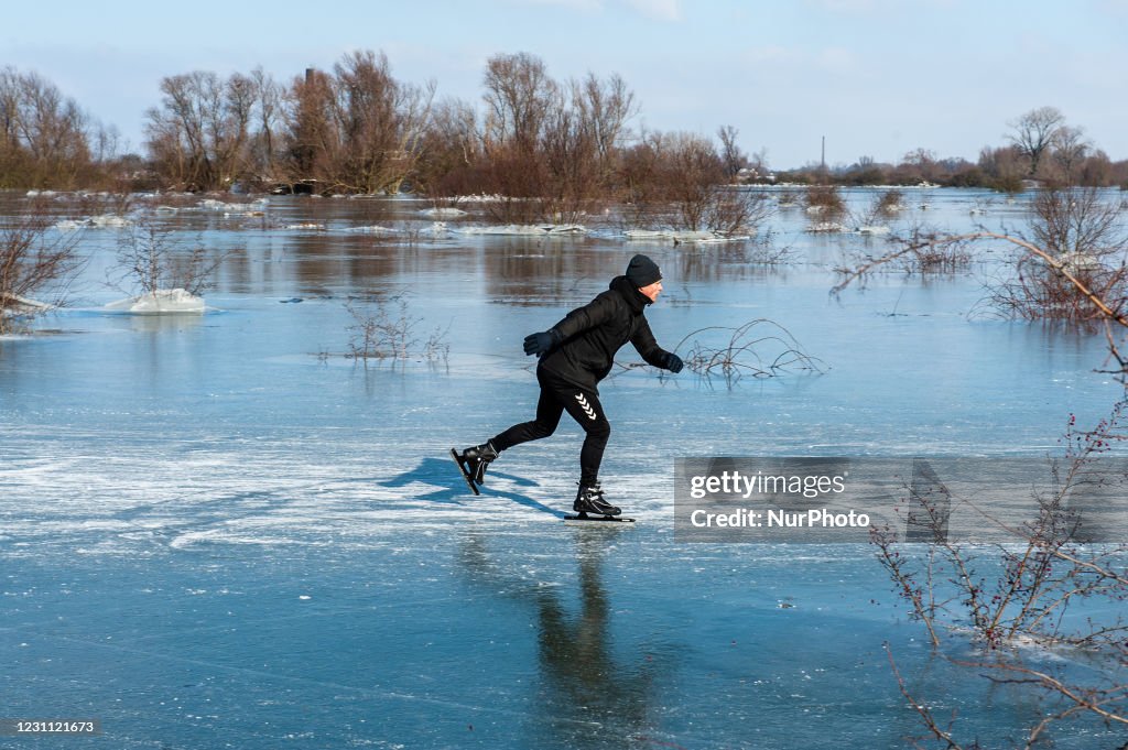 People Skating On Natural Ice In The Netherlands