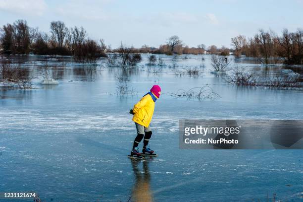 As the wintry weather continues, skaters are taking the chance to skate in one of the frozen lakes close to the Dutch city of Nijmegen, on February...