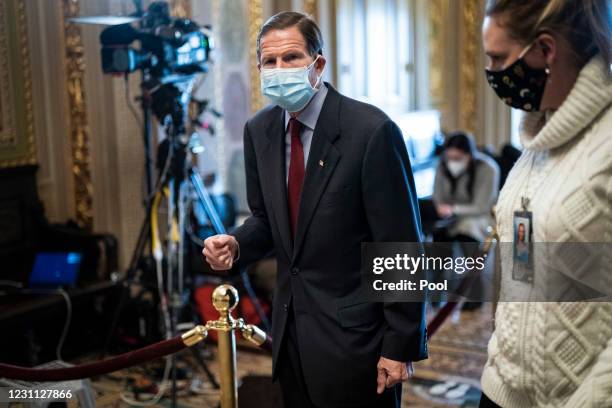 Sen. Richard Blumenthal walks through the Senate Reception room on the fourth day of the second impeachment trial of former President Donald Trump at...