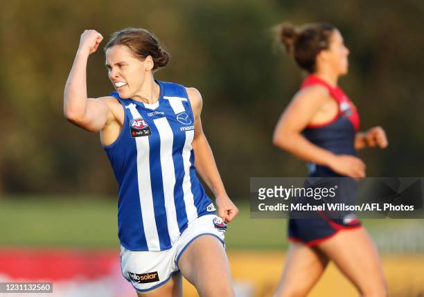 Jasmine Garner of the Kangaroos celebrates a goal during the 2021 AFLW Round 03 match between the Melbourne Demons and the North Melbourne Kangaroos...