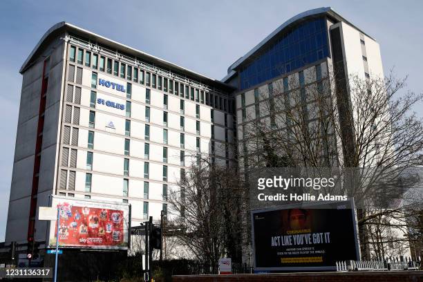 Billboard in view of St Giles Heathrow Hotel which is advertising a quarantine package on their website on February 13, 2021 in London, England. From...