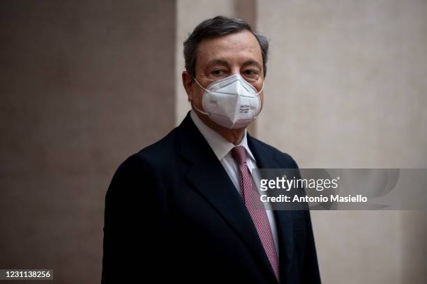 Italian Prime Minister Mario Draghi arrives at Palazzo Chigi before the first Ministry Council meeting of the new Italian government, on February 13,...