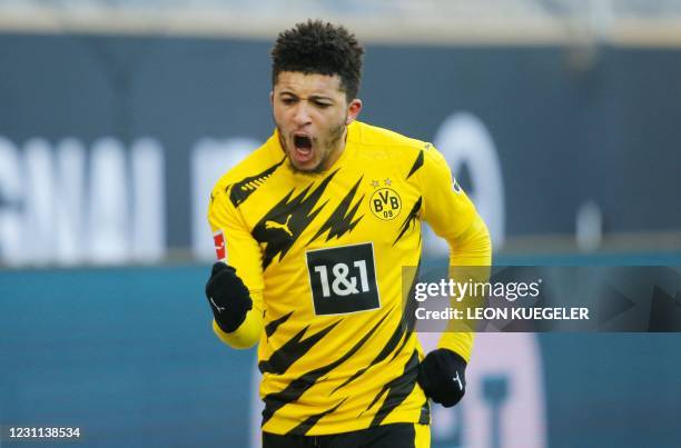 Dortmund's English midfielder Jadon Sancho celebrates after scoring during the German first division Bundesliga football match between Borussia...