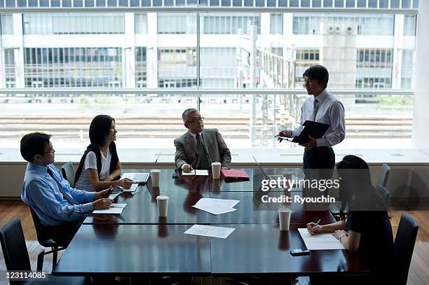 businessmen who is conferring in office - meeting room stock pictures, royalty-free photos & images