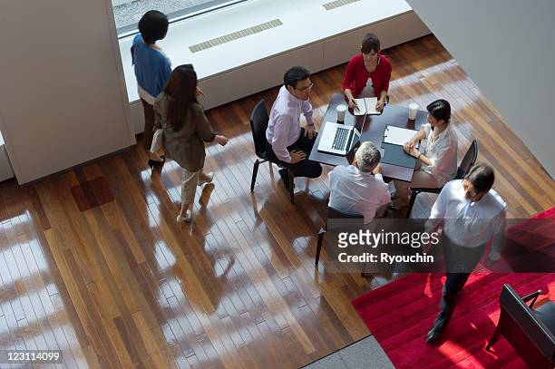 scenery of businesspeople in office - オフィス　日本人　会議　not 多民族 ストックフォトと画像