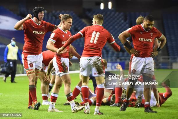 Wales players celebrate their victory at the end of the Six Nations international rugby union match between Scotland and Wales at Murrayfield Stadium...