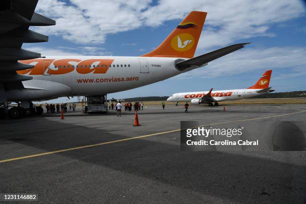 The Airbus 340-200 of Conviasa Airlines arrives with the first batch of 100,000 doses of coronavirus vaccines at Simon Bolivar International Airport...