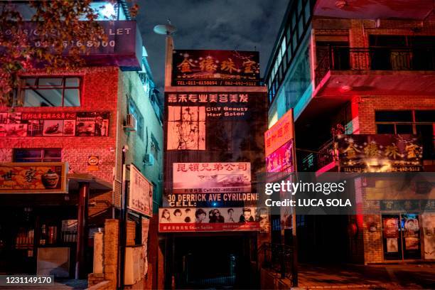 The empty main street of Johannesburg Chinatown, in Cyrildene, on February 13 the first day of the Chinese new year. - According to the Chinese...