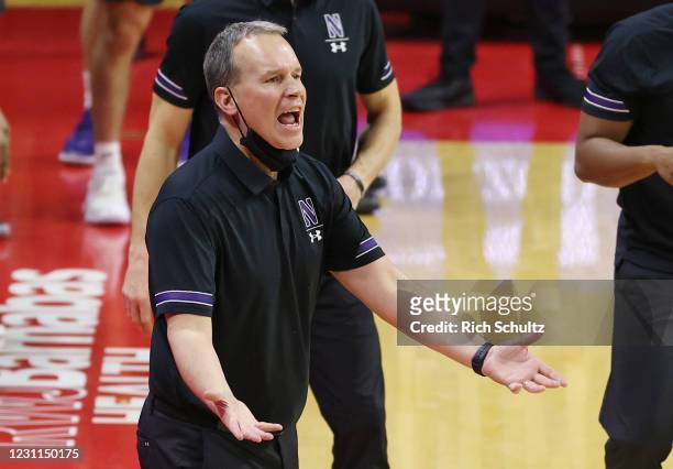 Head coach Chris Collins of the Northwestern Wildcats questions a call during the second half of an NCAA college basketball game against the Rutgers...