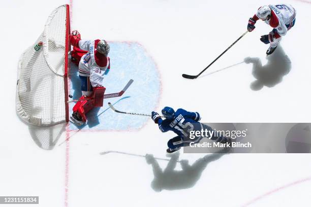 Alexander Kerfoot of the Toronto Maple Leafs shoots against Carey Price of the Montreal Canadiens during the first period at the Scotiabank Arena on...