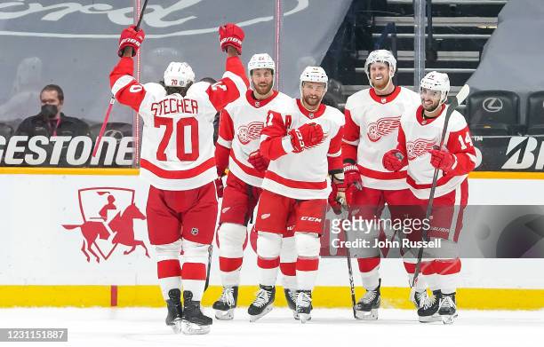 Luke Glendening of the Detroit Red Wings celebrates his goal against the Nashville Predators during the second period at Bridgestone Arena on...