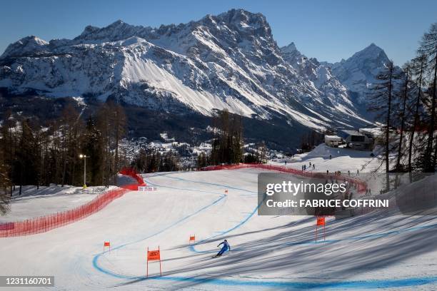 Italy's Dominik Paris competes during the Men's Downhill on February 14, 2021 during the FIS Alpine World Ski Championships in Cortina d'Ampezzo,...