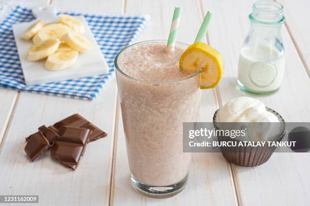 homemade banana chocolate milkshake - chocolate smoothie stock pictures, royalty-free photos & images