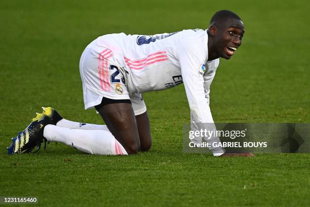 Real Madrid's French defender Ferland Mendy reacts during the Spanish league football match between Real Madrid and Valencia at the Alfredo di...