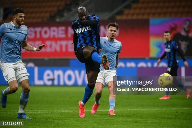 Inter Milan's Belgian forward Romelu Lukaku shoots to score his second goal during the Italian Serie A football match Inter Milan vs Lazio Rome on...