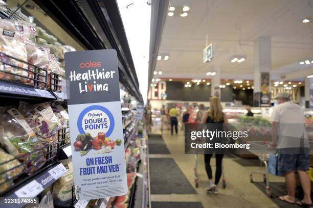 Signage in the fresh produce section at the Coles Group Ltd. Supermarket in the Elsternwick suburb of Melbourne, Australia, on Thursday, Feb. 11,...