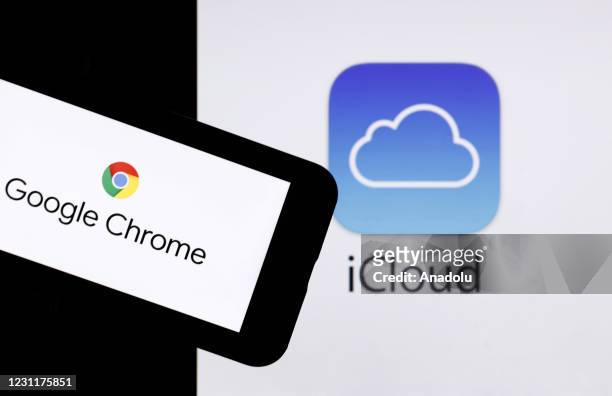 In this photo illustration, a computer screen displays the logo of "iCloud" and a mobile phone screen displays the logo of "Google Chrome" in Ankara,...