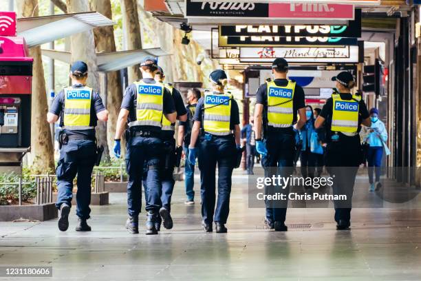 Police patrol the streets of Melbourne at the start of a 'circuit breaker' lockdown imposed suddenly by the Victorian Government. This is due to...