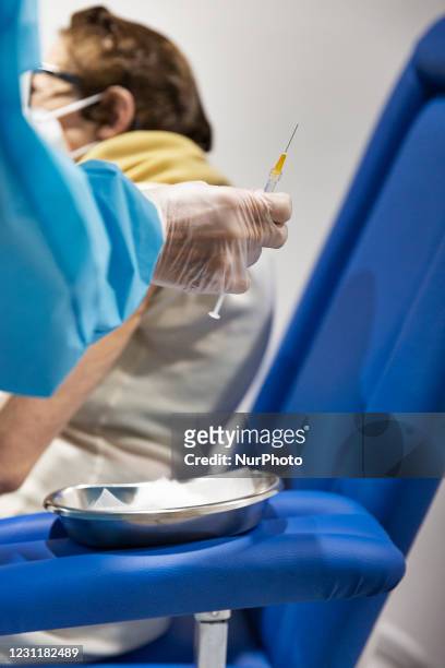 First day of vaccination for the over-80s in Auditorum Park of Musica in Roma on 15th of February, Italy. A healt worker administers a Moderna...