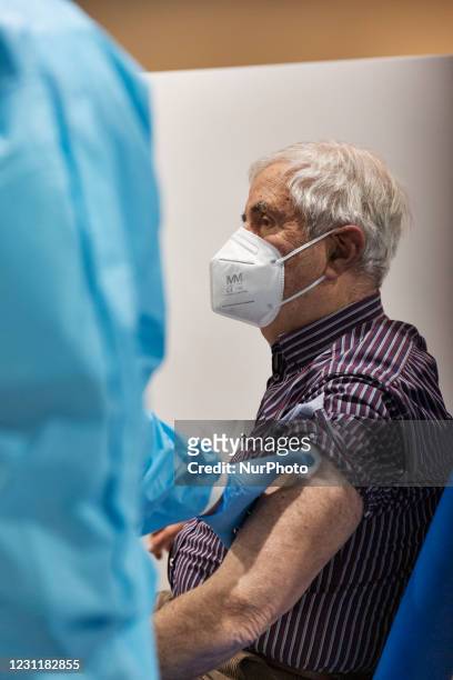 First day of vaccination for the over-80s in Auditorum Park of Musica in Roma on 15th of February, Italy. A healt worker administers a Moderna...