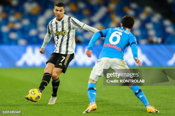 Juventus's Portuguese striker Cristiano Ronaldo controls the ball during the Serie A football match between SSC Napoli and Juventus FC at the Diego...