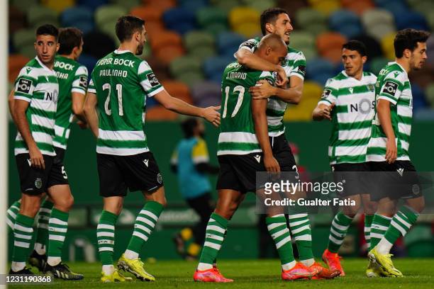 Sporting CP players celebrate after Joao Palhinha of Sporting CP scores a goal during the Liga NOS match between Sporting CP and FC Pacos de Ferreira...